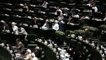  Iranian MPs listen to the speech of Foreign Minister Mohammad Javad Zarif in the parliament in Tehran on July 21, 2015. AFP 