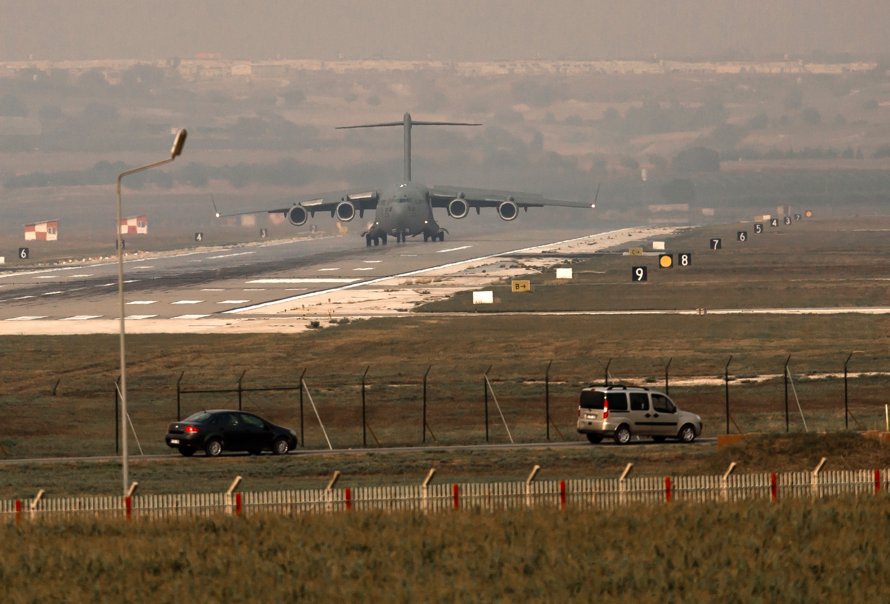 A US Airforce plane lands at the Incirlik airbase, southern Turkey, Saturday, Aug. 31, 2013. AP