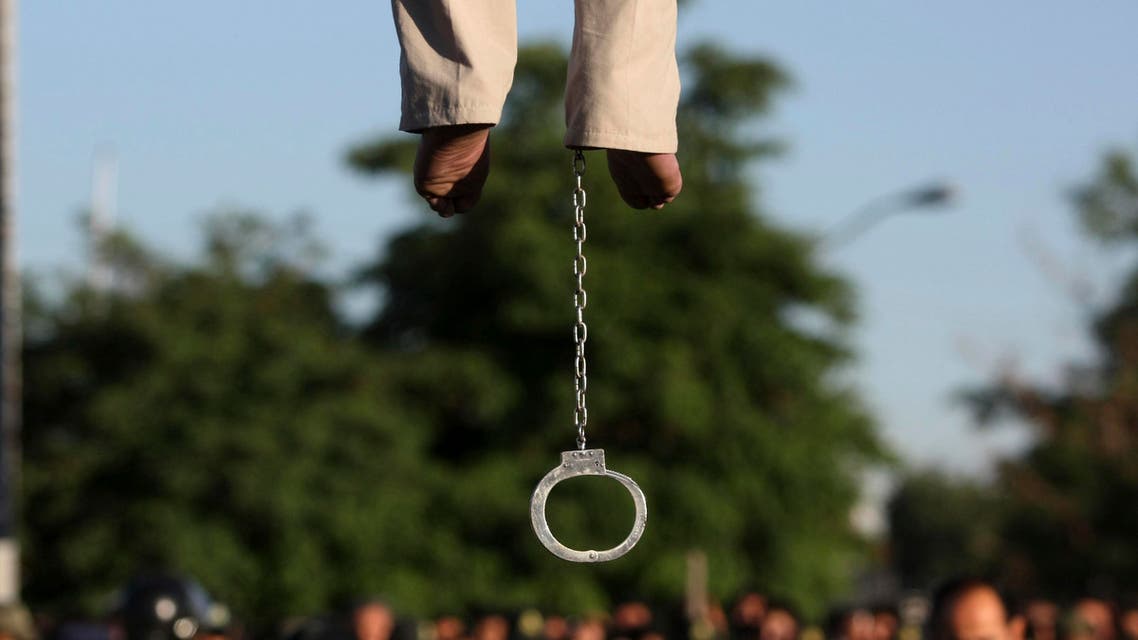 Feet of convicted man Mahdi Faraji, is seen with shackle, while he is being hanged, at the city of Qazvin about 80 miles (130 kilometers) west of the capital Tehran, Iran, Thursday, May, 26, 2011. AP