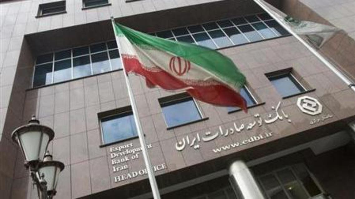 An Iranian flag flutters in front of the head office of the Export Development Bank of Iran (EDBI) in Tehran November 9, 2008.