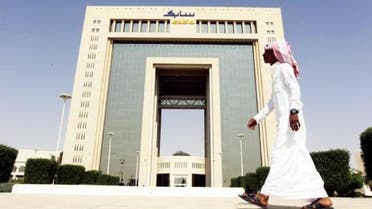 A man walks past the headquarters of Saudi Basic Industries Corp (SABIC) in Riyadh, in this Oct. 27, 2013 photo. (Reuters)