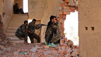 Syrian Kurdish militia reclaims town from ISIS
