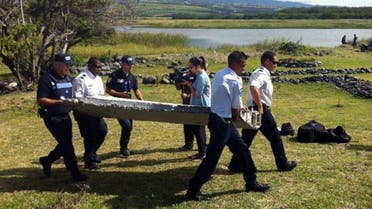 Malaysia has sent a team to verify whether plane debris washed up on a French Indian Ocean island is from missing flight MH370 AFP