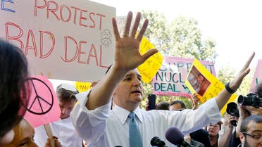 U.S. Republican presidential candidate Cruz debates Iran nuclear deal with Code Pink peace activism group co-founder Benjamin during rally in Washington