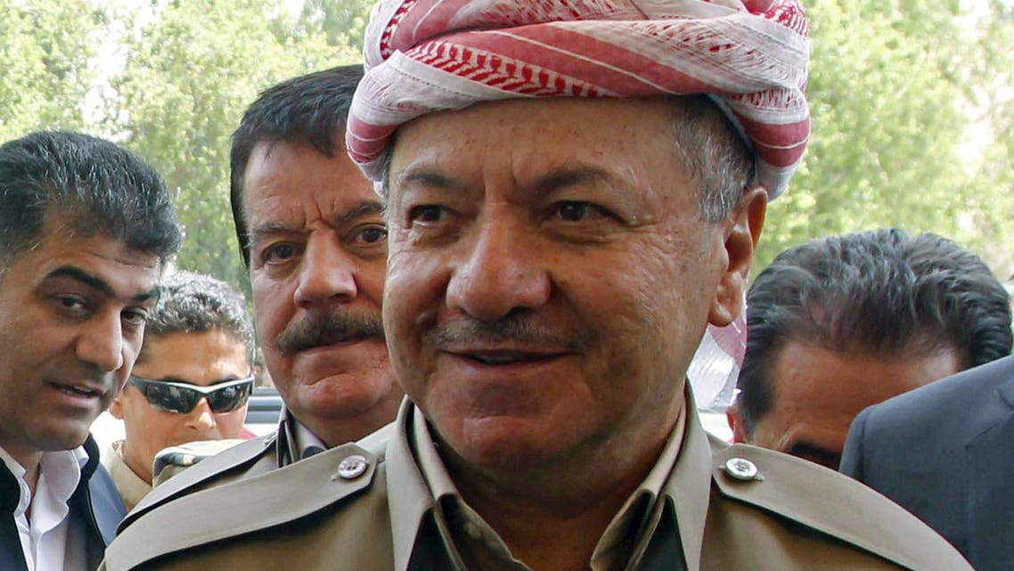 Iraqi Kurdish President Massoud Barzani walks as he visits the Iraqi Kurdish Peshmerga forces, in Kirkuk July 8, 2015. Reuters