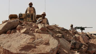 In this Tuesday, April 21, 2015 file photo, Saudi soldiers stand on top of armor vehicles, on the border with Yemen at a military point in Najran, Saudi Arabia. AP