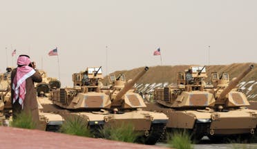 U.S. Army heavy battle tanks are seen during a military parade commemorating the 20th anniversary of the liberation of Kuwait from the 1990 Iraqi invasion. (AP)