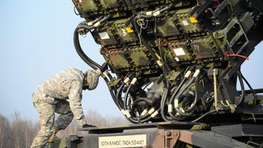 A U.S soldier inspecys a Patriot missile defence battery during join exercises at the military grouds in Sochaczew, near Warsaw, March 21, 2015.