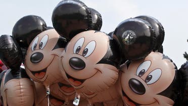 Ballons featuring Mickey Mouse are seen at Disneyland Paris, in Chessy, France, est of Paris, Tuesday, May 12, 2015. (AP)