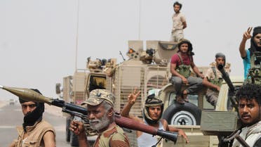 In this photo taken Monday, Aug. 3, 2015, fighters against Shiite rebels known as Houthis gather at the road leading to Al-Anad base near Aden in the southern province of Lahej, Yemen. The capture of the Al-Anad base was a significant victory for the forces allied to Yemen's exiled President Abed Rabbo Mansour Hadi in their battle to reverse the gains of Houthis. (AP) 