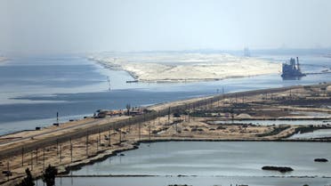 A general view of the Suez Canal from Al Salam "Peace" bridge on the Ismalia desert road before the opening ceremony of the New Suez Canal, in Egypt, August 6, 2015. Egypt will open an expansion to the Suez Canal to great fanfare on Thursday, the centrepiece of President Abdel Fattah al-Sisi's plans to revitalise the country's economy after years of damaging political turmoil. REUTERS/Amr Abdallah Dalsh