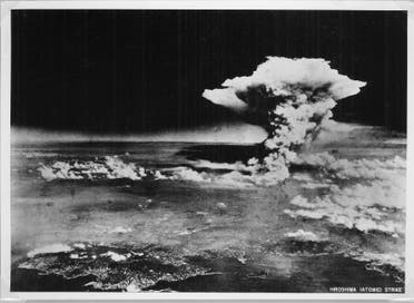 An atomic cloud billows above Hiroshima city following the explosion of the first atomic bomb to be used in warfare in Hiroshima, in this handout photo taken by the U.S. Army on August 6, 1945, and distributed by the Hiroshima Peace Memorial Museum. The words written on the photo are from the source. Mandatory credit REUTERS/U.S. Army/Hiroshima Peace Memorial Museum/Handout via Reuters