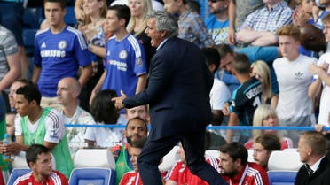 Jose Mourinho shouts across the pitch as Chelsea’s Eden Hazard lies apparently injured following a foul during the English Premier League soccer match between Chelsea and Swansea City at Stamford Bridge, London, Saturday Aug. 8, 2015. (AP)