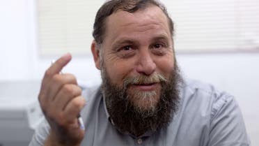  Israeli leader of the extreme right-wing movement Lehava, Organization for Prevention of Assimilation in the Holy Land, Benzi Gopstein talks to journalists on August 11, 2015 in Jerusalem after Israel police questioned him as he condoned torching churches amid an uproar over recent hate crimes, including the deadly firebombing of a Palestinian home. Benzi Gopstein has not been linked to any recent attacks, but his comments regarding churches came at a time of heightened sensitivity over Jewish extremism and drew outrage from Roman Catholic officials. AFP PHOTO / MENAHEM KAHANA