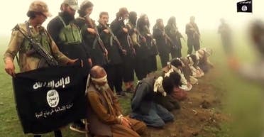 ISIS fighters seen posing with the men they are just about to blow up (Video grab)