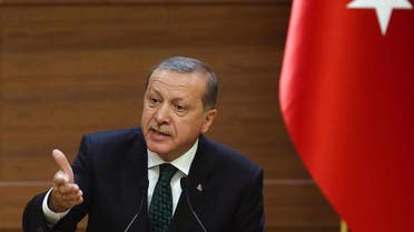   ADM239 - Ankara, -, TURKEY : Turkish President Recep Tayyip Erdogan addresses a meeting at the presidential palace in Ankara on August 12, 2015. Erdogan vowed to fight on against Kurdistan Workers' Party (PKK) militants, in the face of mounting attacks on security forces blamed on the Kurdish rebels. AFP PHOTO/ADEM ALTAN