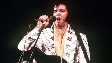 Elvis Presley sings during a 1973 concert. 