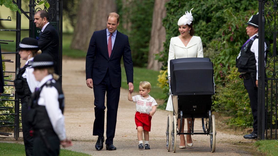 In this file photo dated Sunday, July 5, 2015, Britain's Prince William, Kate the Duchess of Cambridge, their son Prince George walk with their daughter Princess Charlotte in a pram, during an official media event as they arrive for Charlotte's Christening at St. Mary Magdalene Church in Sandringham, England. Royal officials at Kensington Palace are urging all media organizations not to publish images of Prince George and Princess Charlotte, by some paparazzi photographers who are using increasingly dangerous tactics to snap images of the royals, which presents a risk “in a heightened security environment.’’ (AP Photo/Matt Dunham, FILE)