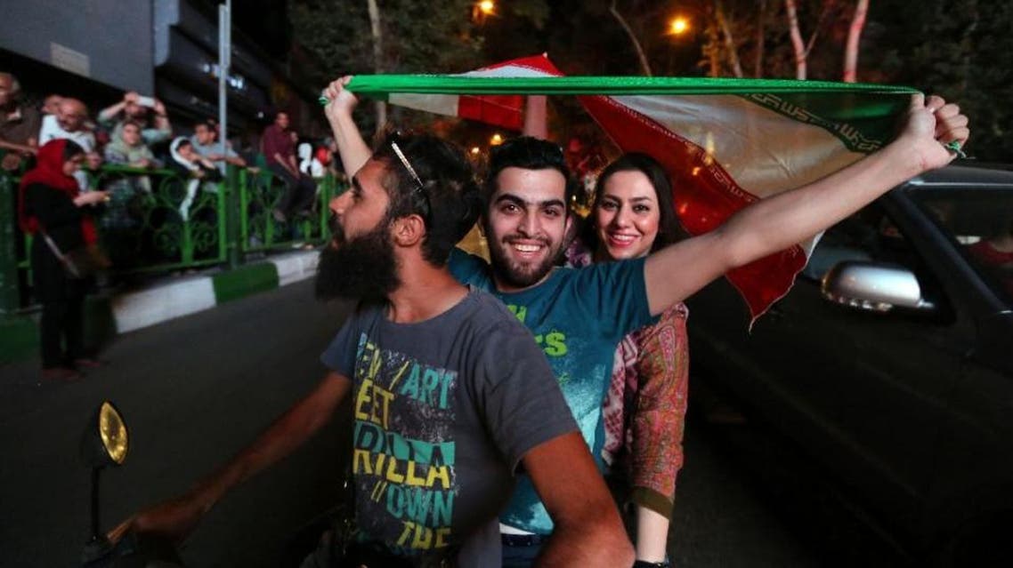 Many Iranians celebrated in the streets after Tehran's nuclear negotiating team struck a deal with world powers in Vienna last month (AFP Photo/Atta Kenare)