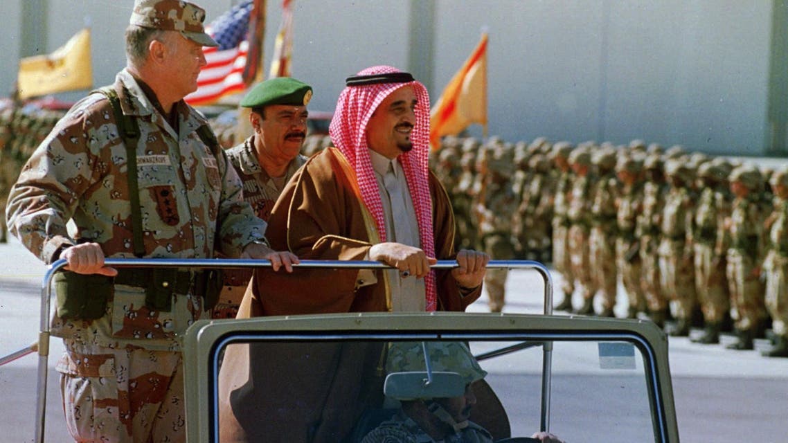 Gen. H. Norman Schwarzkopf accompanies Saudi arabian King Fahd as he reviews U.S. troops at an air base in eastern Saudi Arabia Jan. 7, 1991. This marked the first visit of the king to troops in the field since the August invasion of Kuwait by Iraq. (AP)