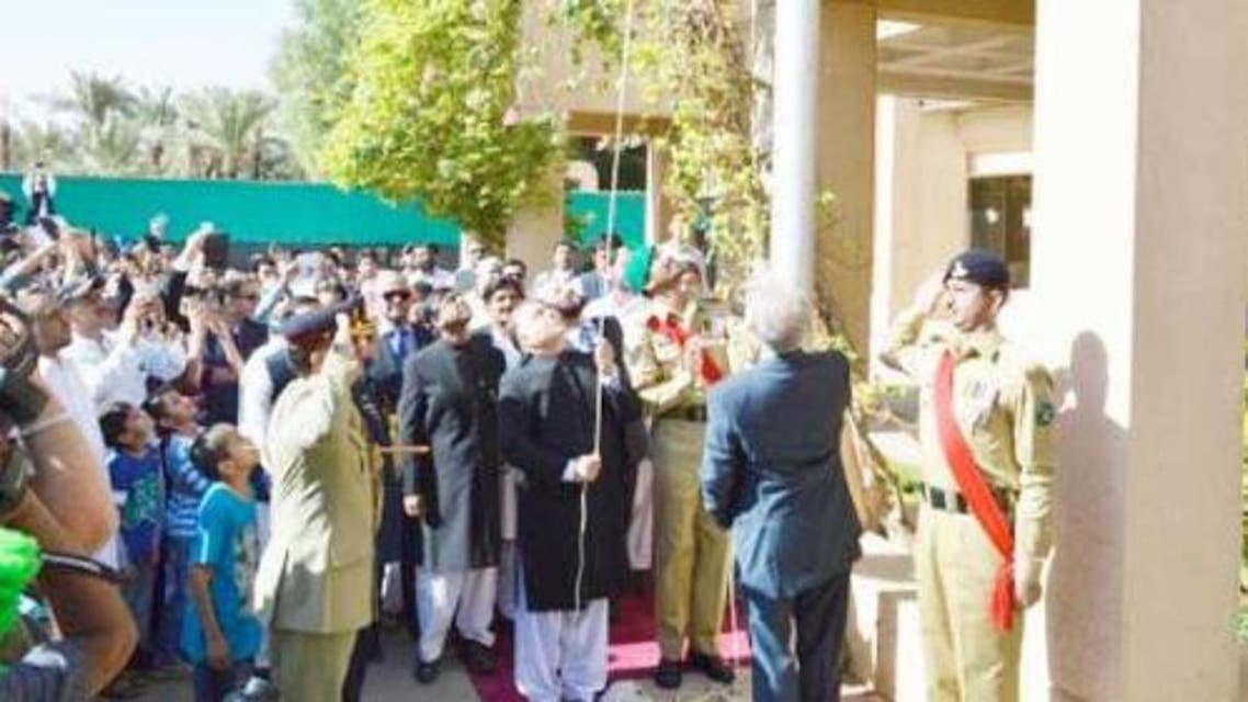 Pakistan Ambassador Manzur ul Haq unfurls the national flag at the embassy in Riyadh. (Photo courtesy: saudi Gazette)