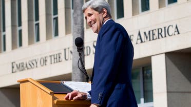 Secretary of State John Kerry smiles while delivering his remarks during the flag raising ceremonies at the newly reopened embassy in Havana, Cuba. Friday, Aug. 14, 2015. (AP)