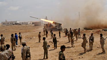 In this photo provided by Yemen's Defense Ministry, Yemeni army soldiers fire rockets at mountainous positions of al-Qaida militants at the town of Meyfaa, in the southern province of Shabwa, Yemen, Sunday, May 4, 2014. (AP)
