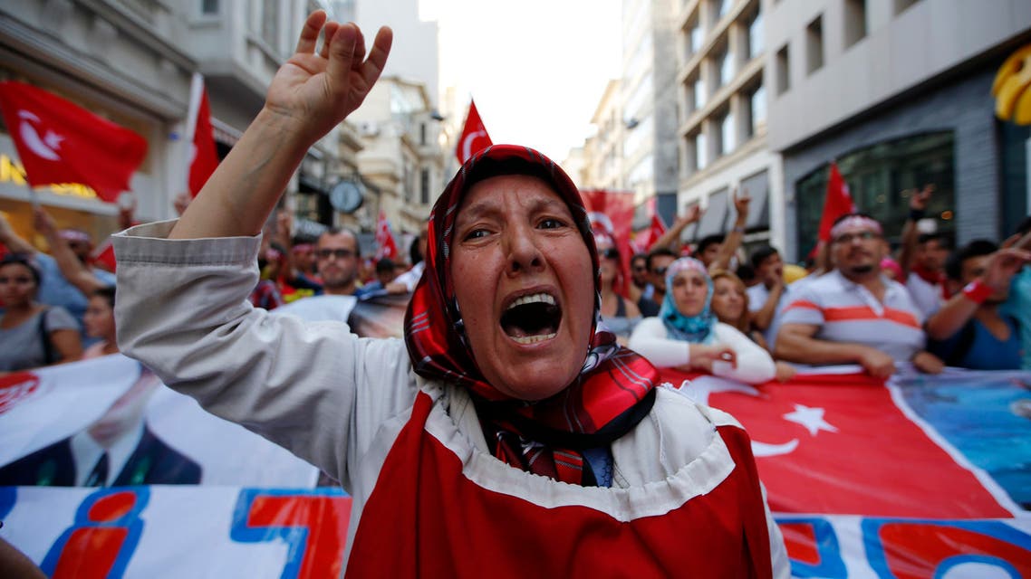 A group of Turkish nationalists chant slogans, protesting against against Kurdistan Workers' Party (PKK) militants' recent attacks on Turkish security forces, during a march in Istanbul, Sunday, Aug. 16, 2015.