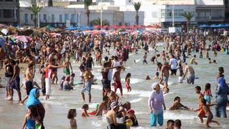 Last burst of summer fun for Tunisia’s doomed beach hotels