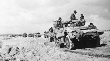 A column of Israeli army half tracks travel through the Negev Desert area of Palestine during recent action against the Egyptians, Jan. 6, 1949. (AP)