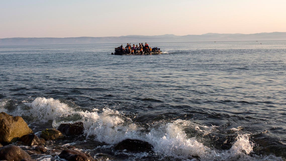 Migrants from Syria and Afghanistan arrive on an overcrowded dinghy from the Turkish coasts to the Greek island of Lesbos, Monday, July 27, 2015. Nearly 50,000 people have illegally entered the country this year, mostly Syrian refugees who risk the sea crossing from Turkey in dangerous, overcrowded boats. From Greece, most try to continue north through the Balkans to more affluent European countries such as Germany. (AP Photo/Santi Palacios)