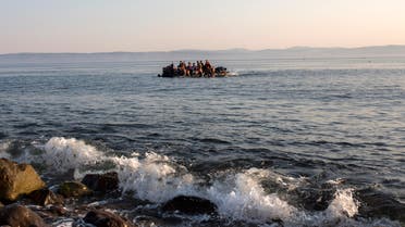 Migrants from Syria and Afghanistan arrive on an overcrowded dinghy from the Turkish coasts to the Greek island of Lesbos, Monday, July 27, 2015. Nearly 50,000 people have illegally entered the country this year, mostly Syrian refugees who risk the sea crossing from Turkey in dangerous, overcrowded boats. From Greece, most try to continue north through the Balkans to more affluent European countries such as Germany. (AP Photo/Santi Palacios)