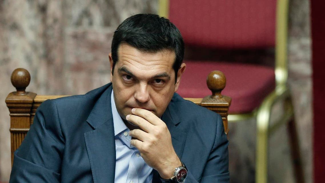 Greek Prime Minister Alexis Tsipras listens during a parliamentary session in Athens, Friday, Aug. 14, 2015. (AP)