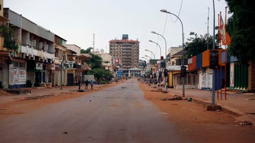 The streets of downtown Bangui remain deserted Friday May 30, 2014. Bangui came to a standstill for the second day running as demonstrators set barricades to protest Wednesday's attack on a catholic church that left 15 dead. (AP Photo/Jerome Delay)