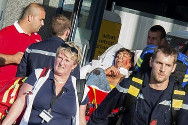 French emergency services transport a victim after a shooting on the Amsterdam to Paris Thalys high-speed train in Arras, France, August 21, 2015.  (Reuters)