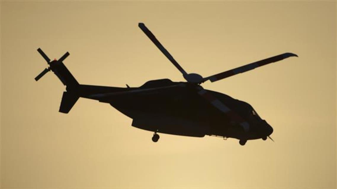 A Saudi Special Forces helicopter flies in the capital, Riyadh, on May 19, 2015. (AFP)