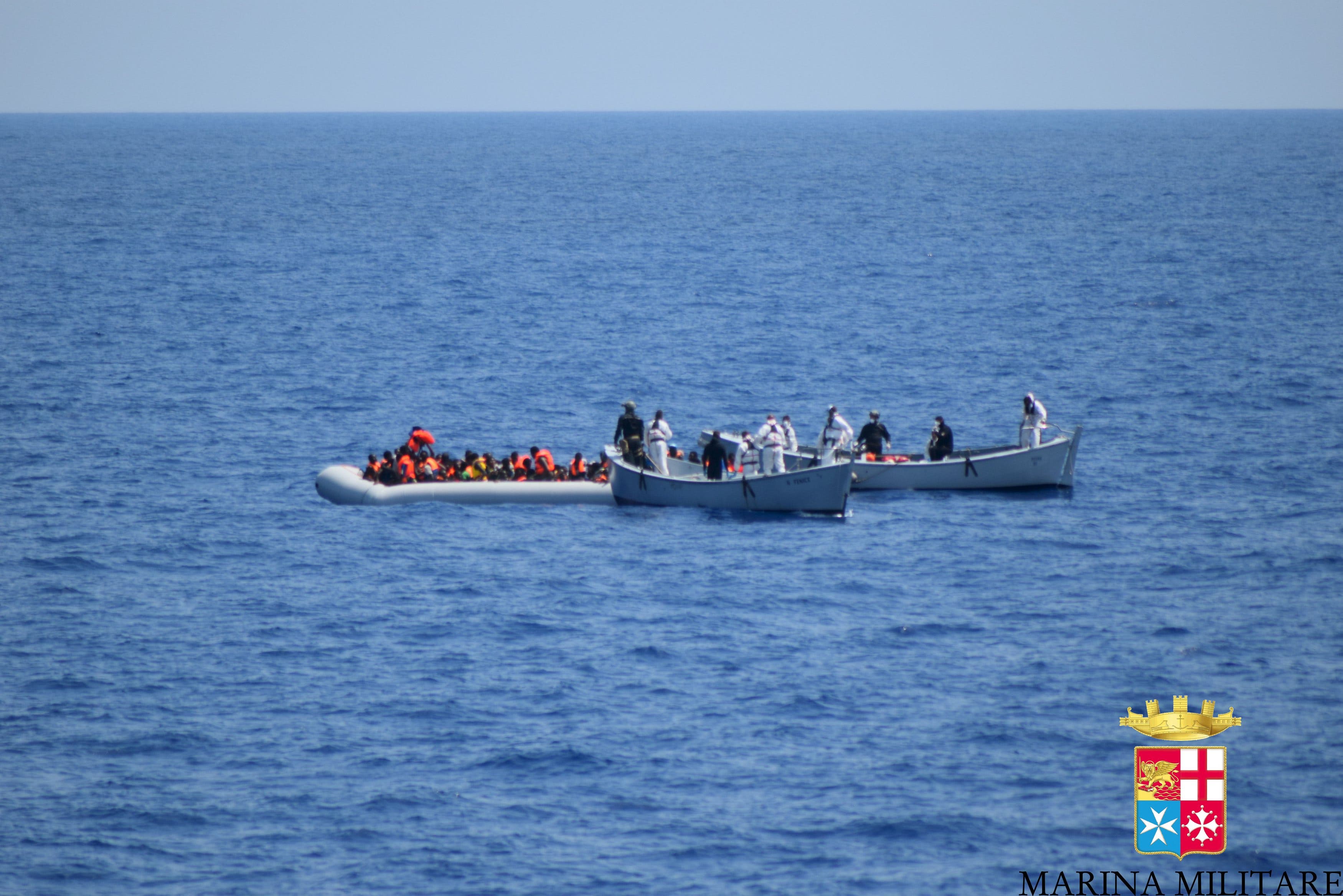 Italian navy rescues migrants in the Mediterranean