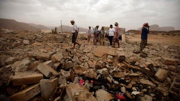 In Yemen, tribesmen stand on the rubble of a building destroyed by a U.S. drone air strike, that targeted suspected al-Qaeda militants on Feb. 3, 2013. (Reuters)