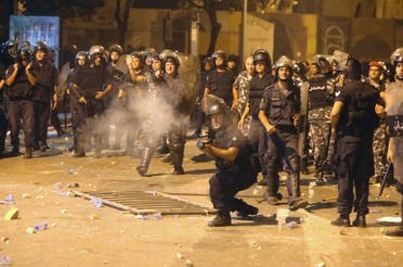  Lebanese riot police seen firing tear gas 