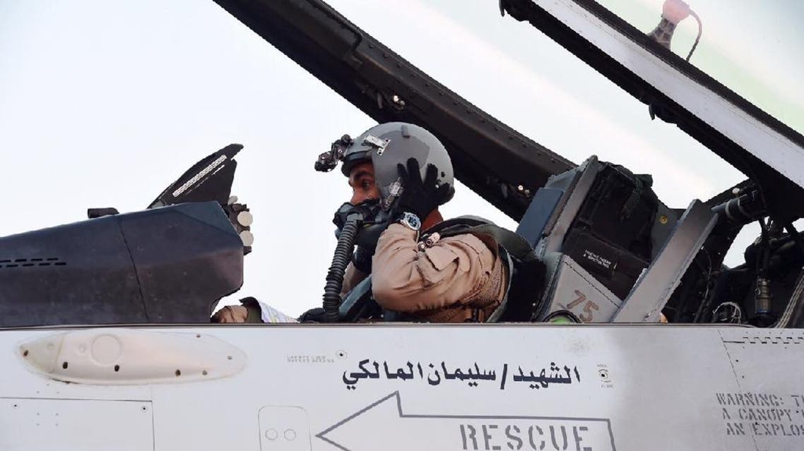 A pilot sitting in a cockpit of a fighter jet of the UAE armed forces on the tarmac of a Saudi air force base after raids against Houthis in Yemen (File photo: AFP)