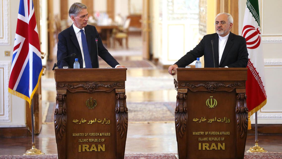 British Foreign Secretary Philip Hammond, left, speaks during a press conference with Iranian Foreign Minister Mohammad Javad Zarif, in Tehran, Iran, Sunday, Aug. 23, 2015. AP