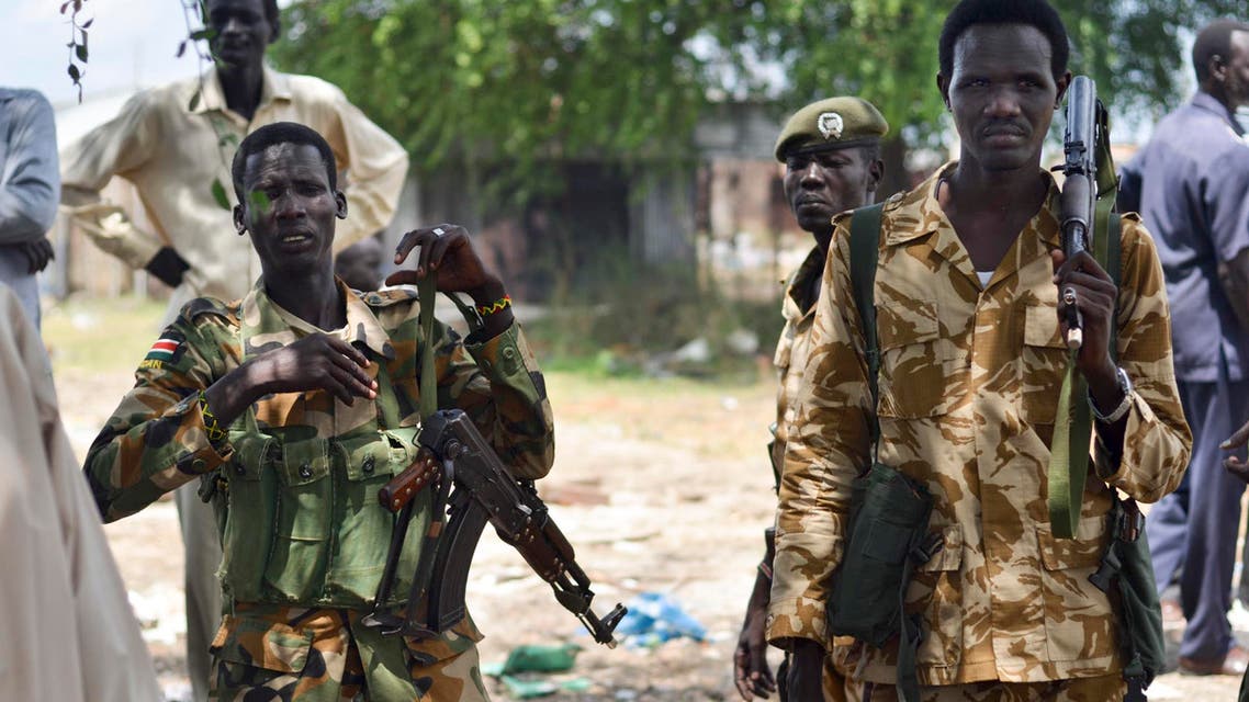 In this photo taken Wednesday, June 24, 2015, South Sudanese government soldiers patrol in Bentiu town, South Sudan. AP