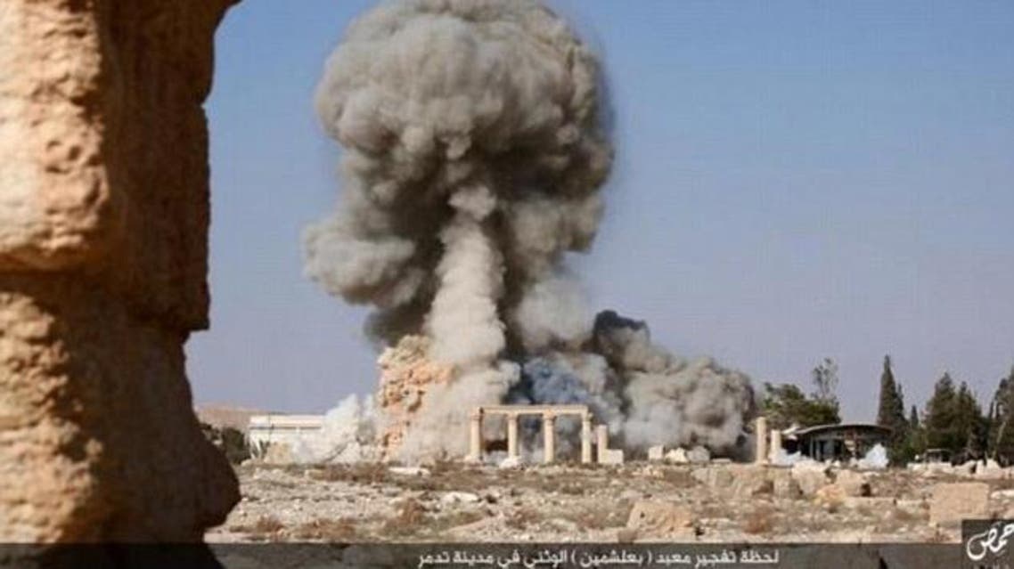 Smoke rises from the Baalshamin temple after ISIS militants filled it with explosives and detonated them in the ancient wonder. (Twitter)
