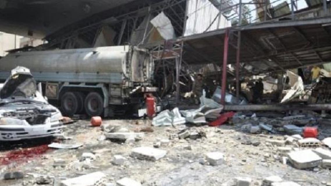 Debris following a rocket attack in the government-controlled Syrian city of Homs. (AFP)