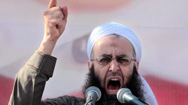 In this March 4, 2011, file photo, Sheikh Ahmad al-Assir, a Lebanese anti-Syrian regime leader, addresses his supporters during a demonstration against Syrian President Bashar Assad at the Martyrs square in downtown of Beirut, Lebanon. (AP)