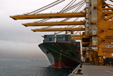  In this Sunday, Feb. 8, 2009 file photo, a cargo ship docks to off load its containers at the Jebel Ali port terminal 2 in Dubai, United Arab Emirates. (File photo: AP)