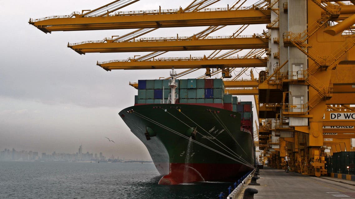 FILE - In this Sunday, Feb. 8, 2009 file photo, a cargo ship docks to off load its containers at the Jebel Ali port terminal 2 in Dubai, United Arab Emirates. Port operator DP World said Thursday it has reached a deal to buy the Dubai government-linked operator of free-trade zones in the Middle Eastern commercial hub for $2.6 billion. (AP Photo/Kamran Jebreili, File)