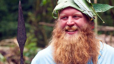 A 2014 photo provided by Justin Wren shows mixed martial arts fighter Justin Wren in the homeland of the Mbuti pygmy tribe in the Ituri Rainforest in the Democratic Republic of Congo. AP