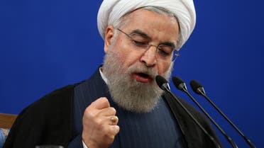  Iranian President Hassan Rouhani speaks during a press conference in Tehran, Iran, Saturday, Aug. 29, 2015. Rouhani said Saturday he opposed a parliamentary vote on the landmark nuclear deal reached with world powers, saying terms of the agreement will turn into legal obligation if it is passed by the house. (AP Photo/Ebrahim Noroozi)