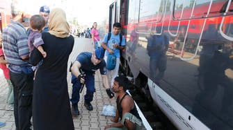 Hungary allowing migrants onto trains bound for Vienna and Germany